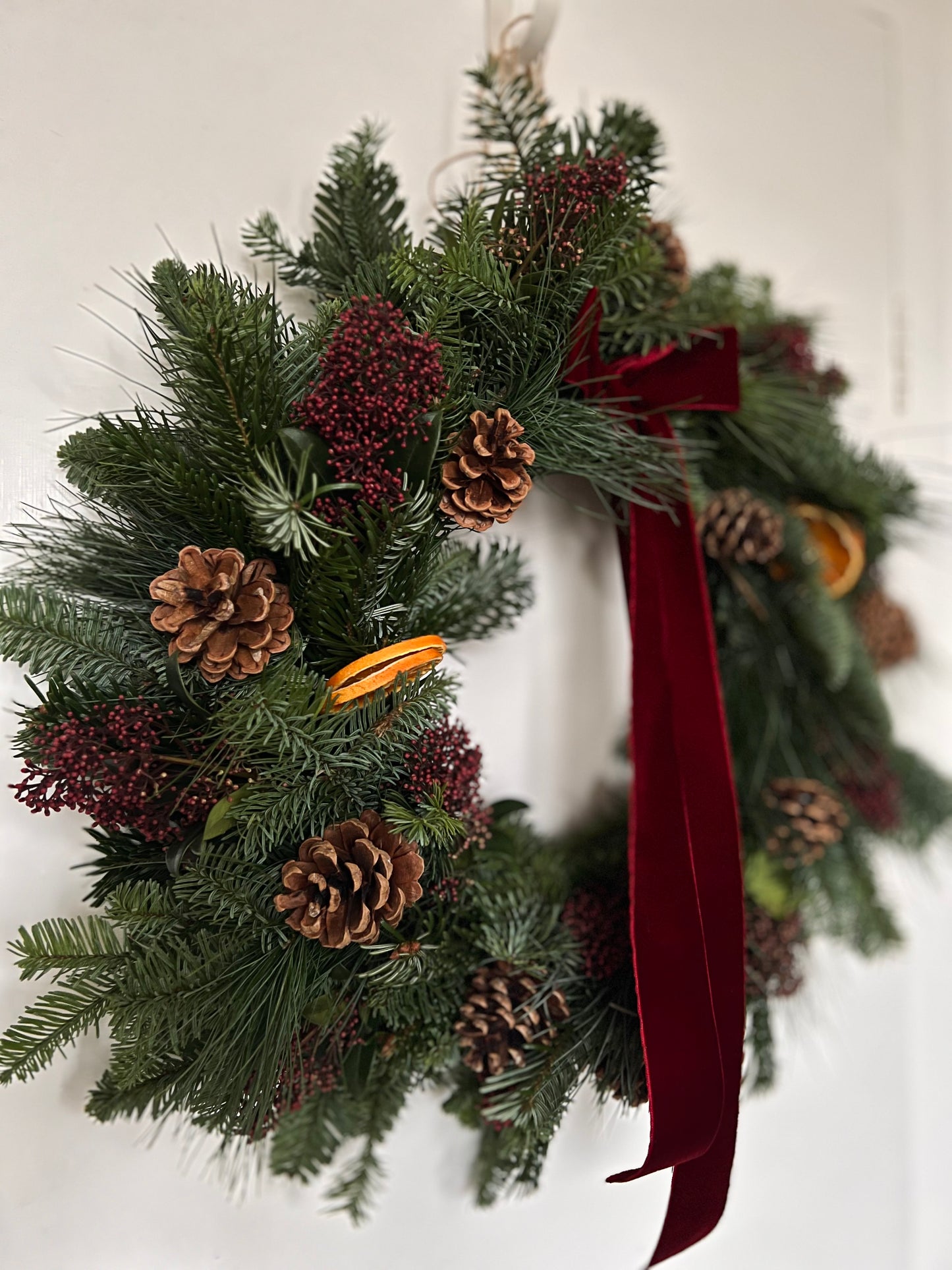 Large Christmas Wreath with Fresh Foliage Pinecones and Oranges, Burgundy Velvet Ribbon