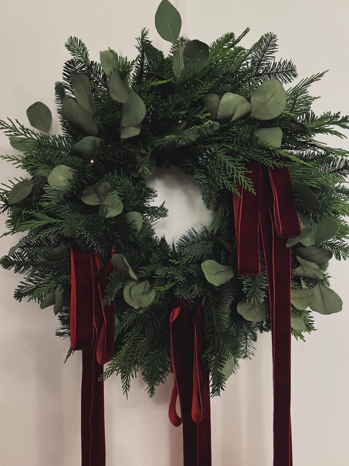 Woodland Christmas Wreath with Eucalyptus and Burgundy Velvet Ribbons