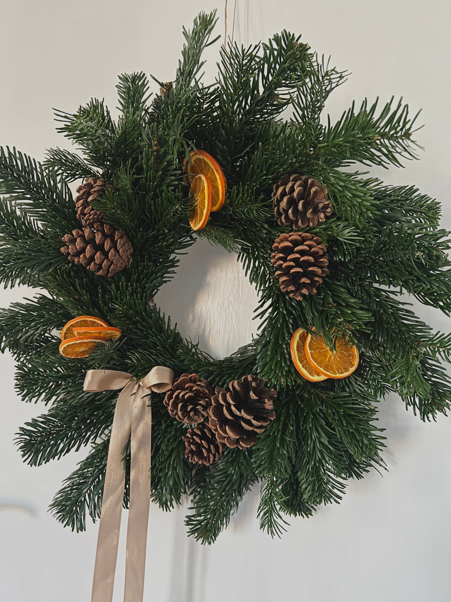 Large Christmas Wreath with Fresh Foliage Pinecones and Oranges