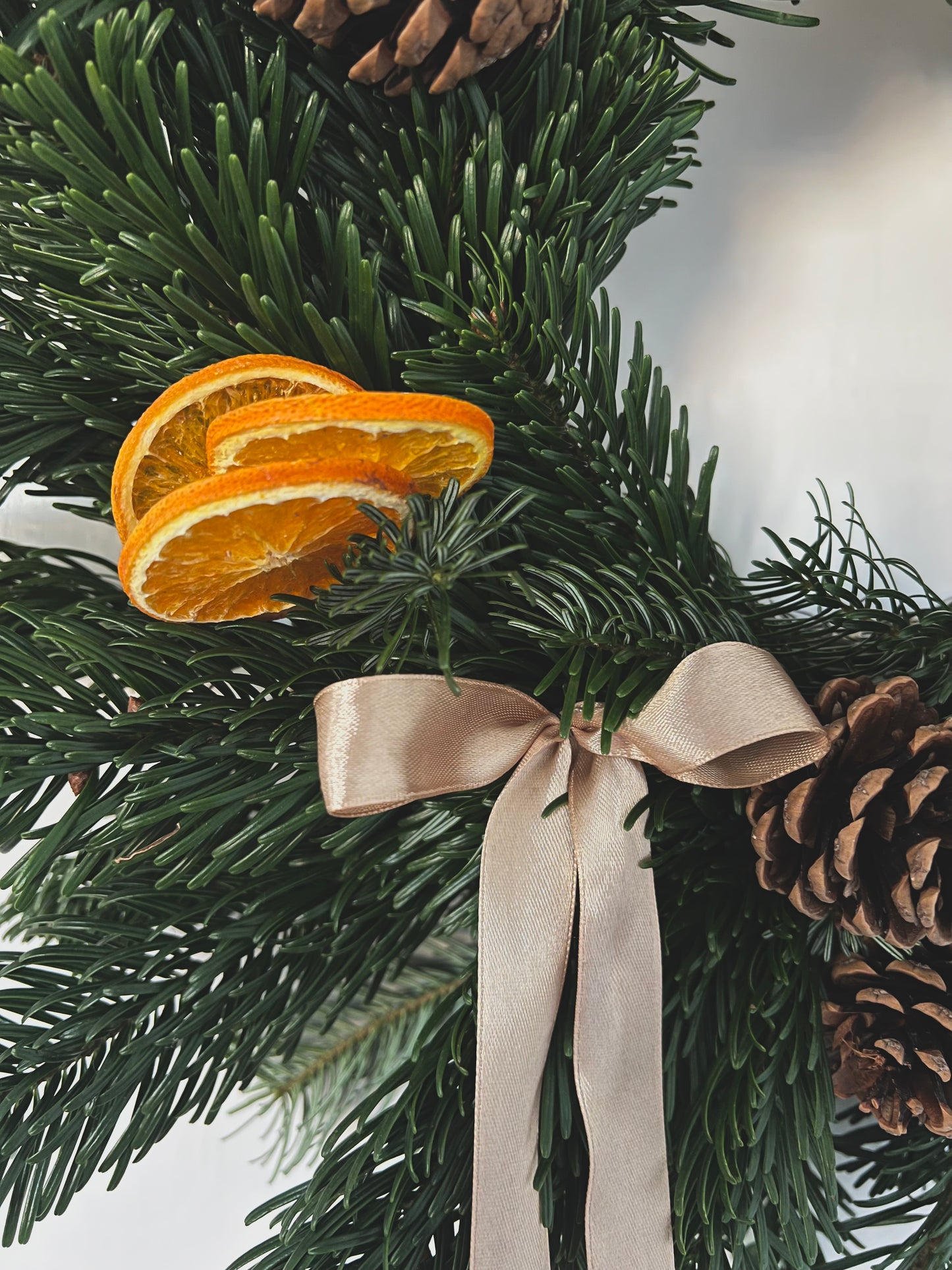 Large Christmas Wreath with Fresh Foliage Pinecones and Oranges