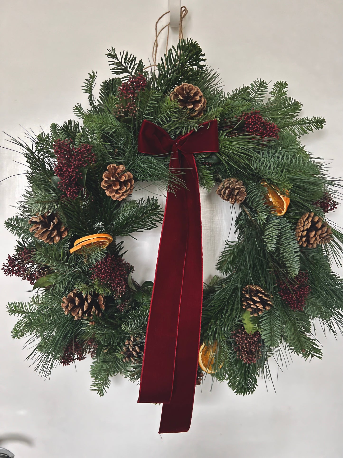 Large Christmas Wreath with Fresh Foliage Pinecones and Oranges, Burgundy Velvet Ribbon