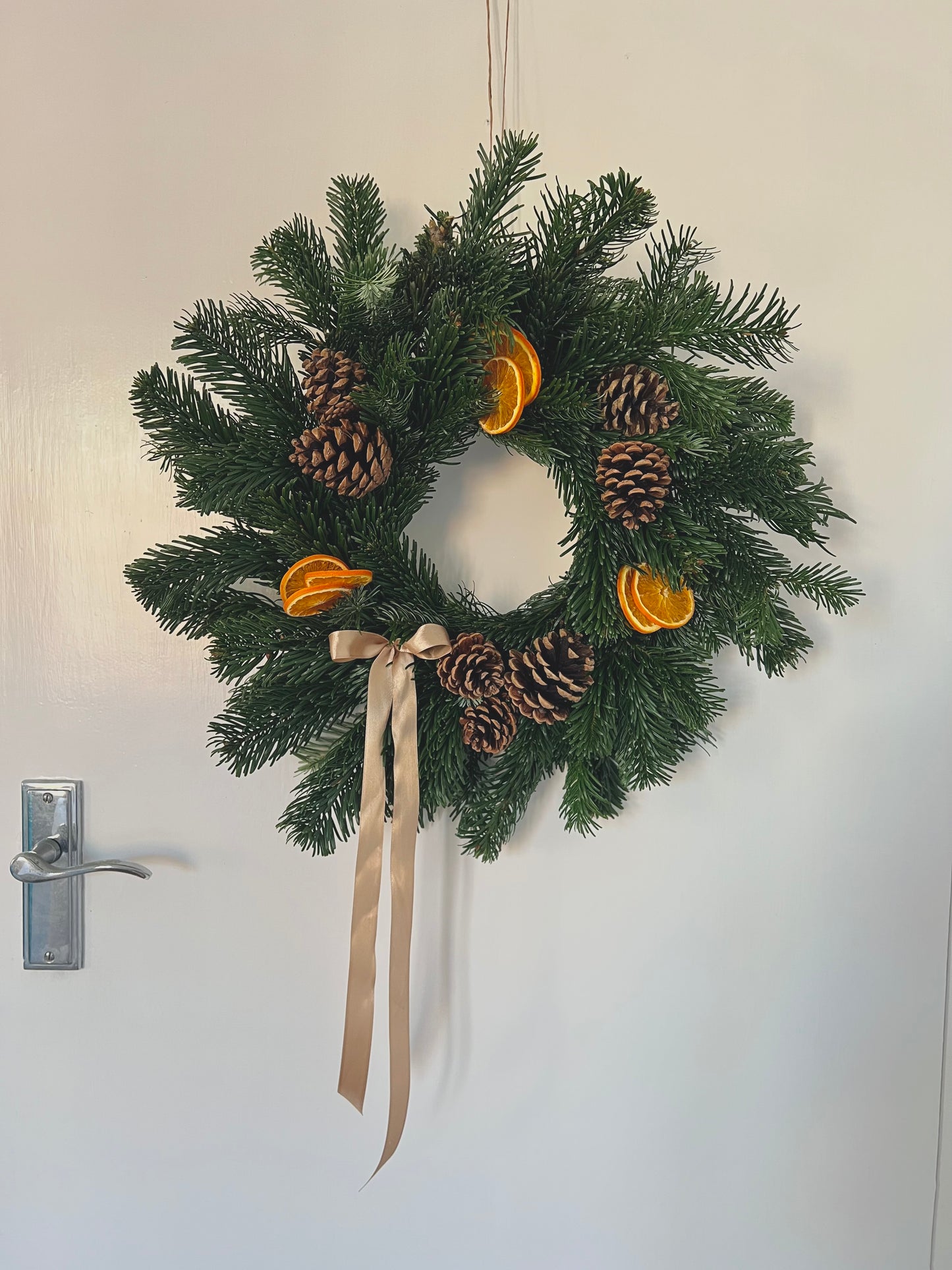 Large Christmas Wreath with Fresh Foliage Pinecones and Oranges