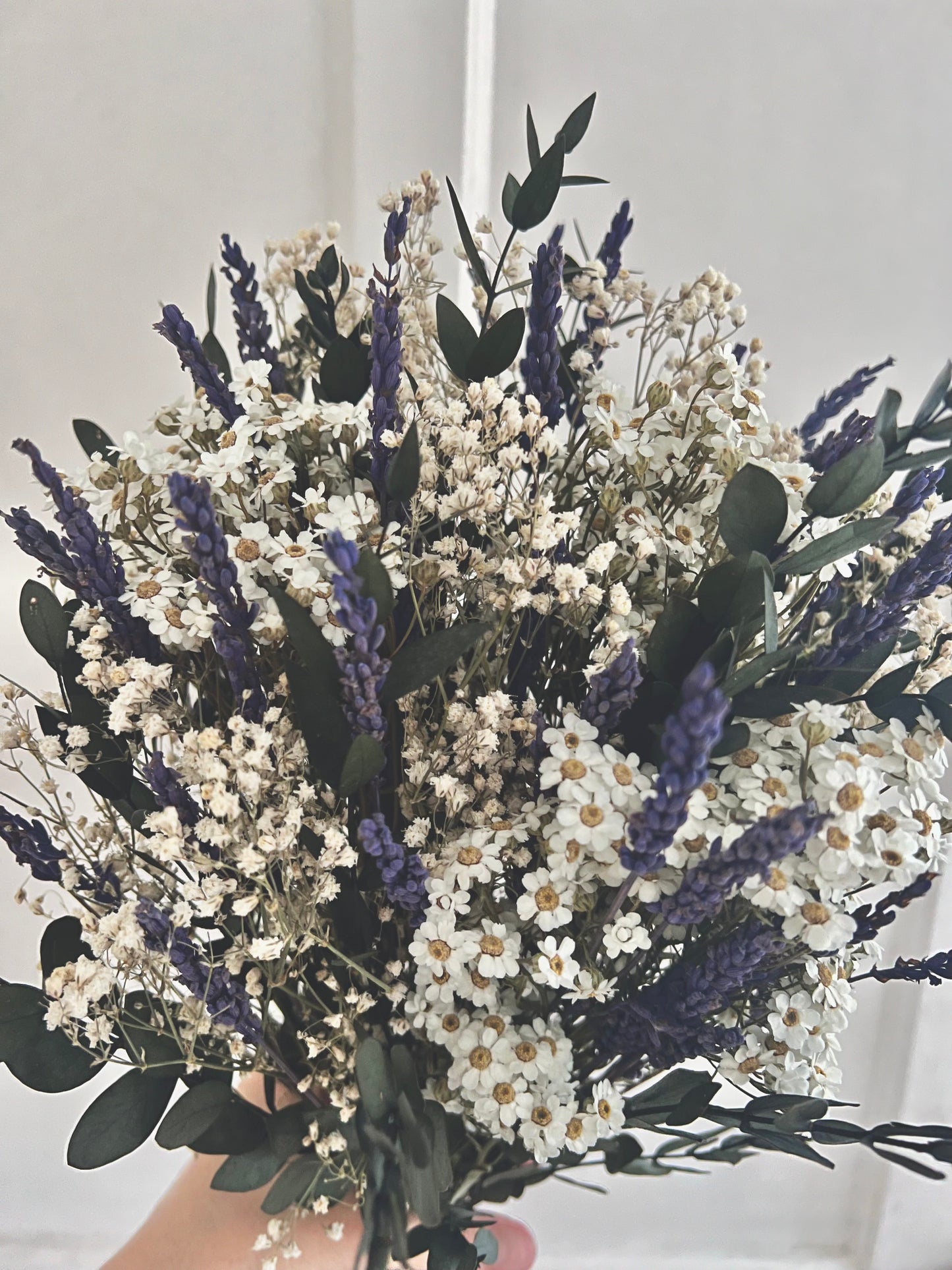 Dried daisy and lavender wedding accessories