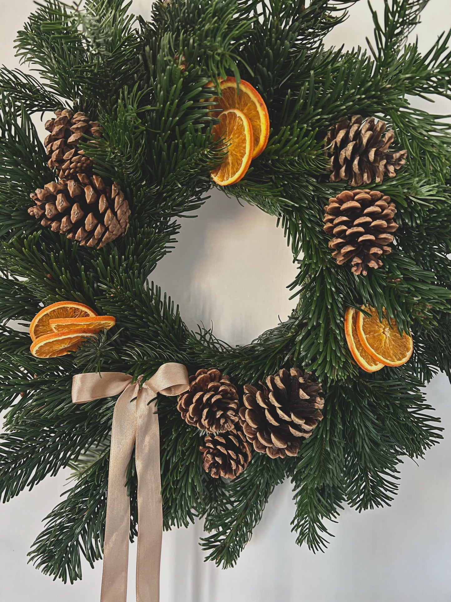 Large Christmas Wreath with Fresh Foliage Pinecones and Oranges